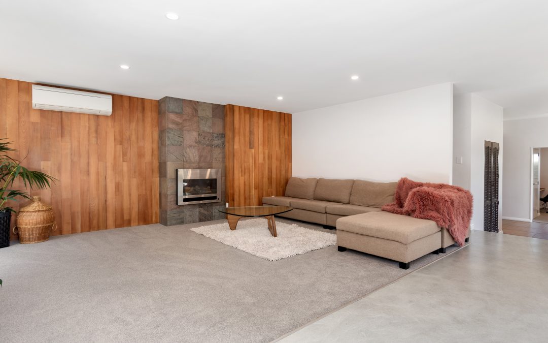 Timber feature wall around gas fire Oceanbeach road